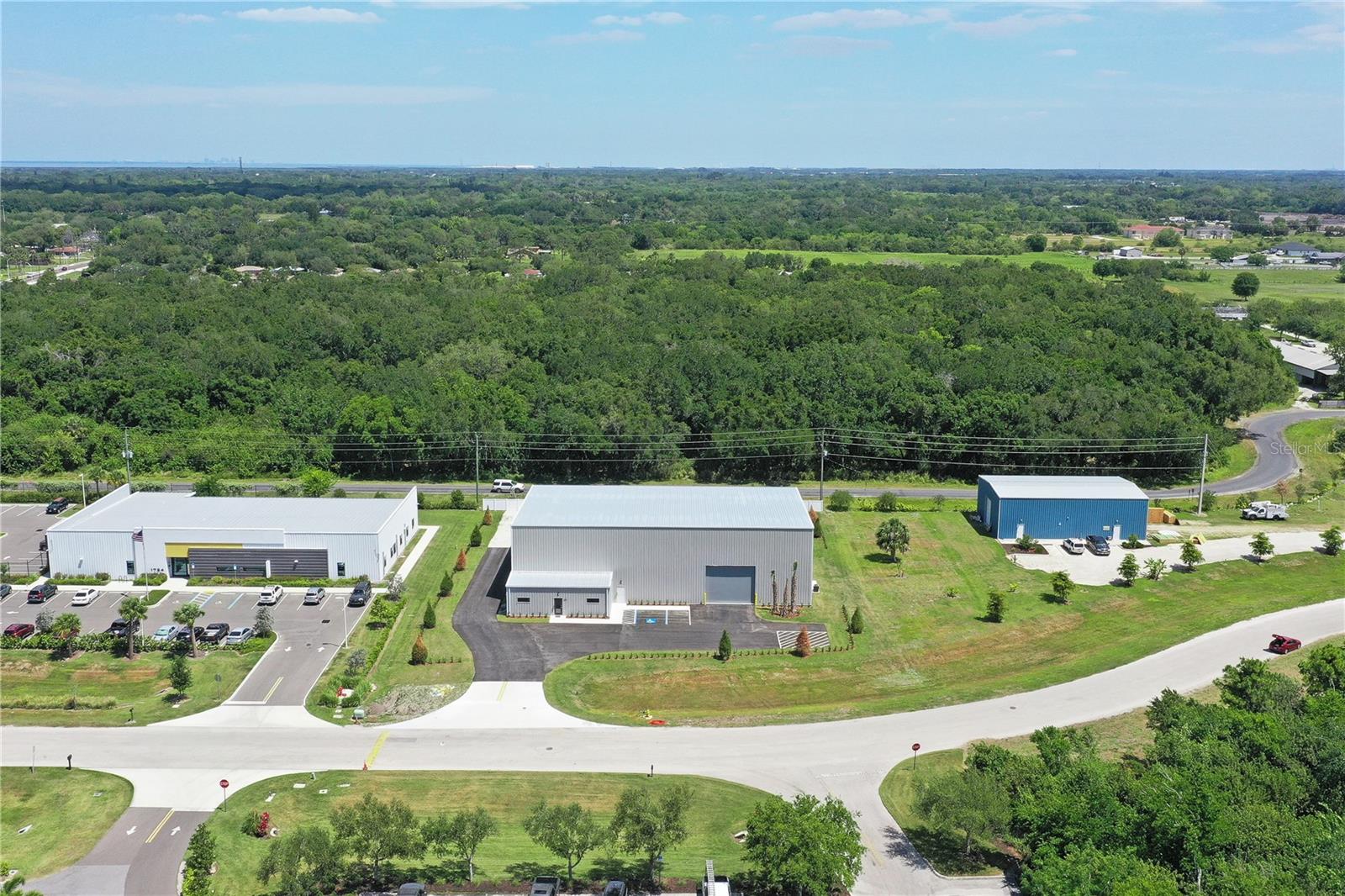 Accepting Back-up Offers
FOR SALE: The property is zoned Light Industrial. This building was constructed in 2024. It is a 10,240 sq/ft building with an office (40ftx16ft) and a warehouse (120ftx80ft). It sits on 1.1 acres.
The Warehouse features:
Clear span construction with 30ft ceiling height.
Fully insulated.
3- Oversized 20ftx16ft roll-up doors. Two in the rear and one in the front.
3- Man doors. One on the front, rear, and west side.
*Property Information received from third-party sources is considered reliable but is not guaranteed. All information should be independently verified by buyers and buyer's agent.
2- 12ft shop fans with controllers.
Led lighting.
The office has 2 private offices, an entry area, A/C, a restroom, and a kitchenette area