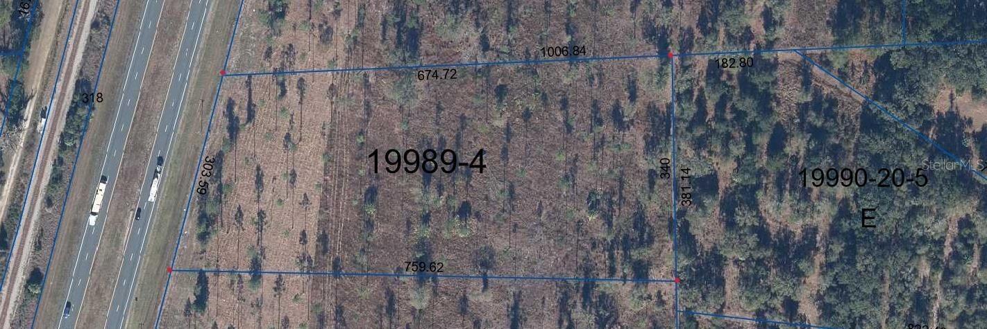 5.20 acres with plenty of room for a couple of horses or cows. Property has been recently cleared and fenced, New culvert installed to provide access from and to US 301. Close to Holden Park Boat Ramp. Enjoy fishing in Holden Pond & Moss Lee Lake. Just south of Hawthorne. 30 minutes from Gainesville, Ocala and Starke.