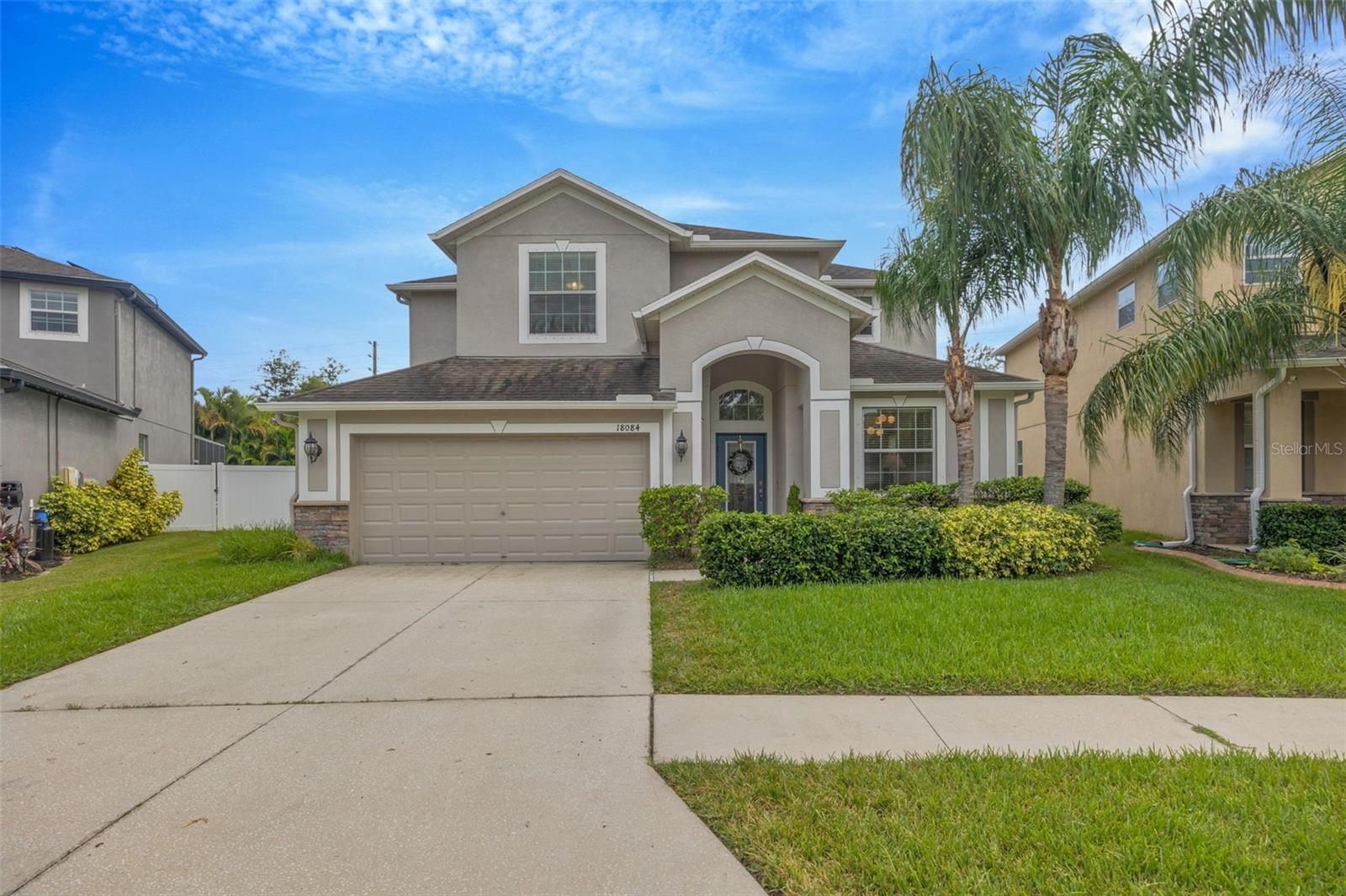 Welcome to this stunning 5-bedroom, 3-bathroom home located in the highly sought-after community of Concord Station in Land O’ Lakes! This spacious two-story property features a 3-car tandem garage and fully paid-off solar panels for energy efficiency. Freshly painted interior complements a thoughtfully designed layout with a formal living room, dining room, and a large family room on the main floor—perfect for entertaining or everyday living. Upstairs you'll find three secondary bedrooms, two full bathrooms, and a large versatile loft space ideal for a game room, office, or additional living area. The expansive primary suite boasts dual walk-in closets and a spa-like en-suite bathroom with a soaking tub, walk-in shower, and dual vanities. Located in a top-rated school district, Concord Station offers resort-style amenities including a clubhouse, fitness center, tennis and basketball courts, and a resort-style pool. Just minutes from the Suncoast Parkway, shopping, dining, and only 25 minutes to Tampa International Airport and Tampa Bay’s world-famous beaches—this home offers the perfect blend of comfort, style, and convenience!