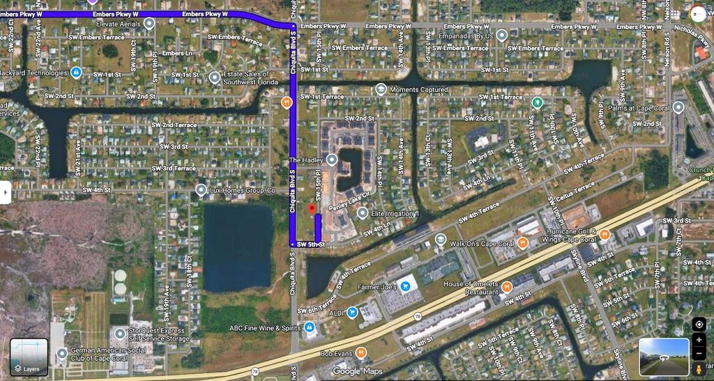 Photo of 410 SW 15th Place, Cape Coral, FL 33991 (MLS # O6385099)