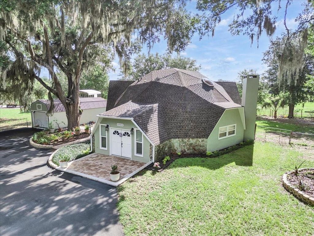 Photo of 10424 Lyons Avenue, Lithia, FL 33547 (MLS # TB8507283)