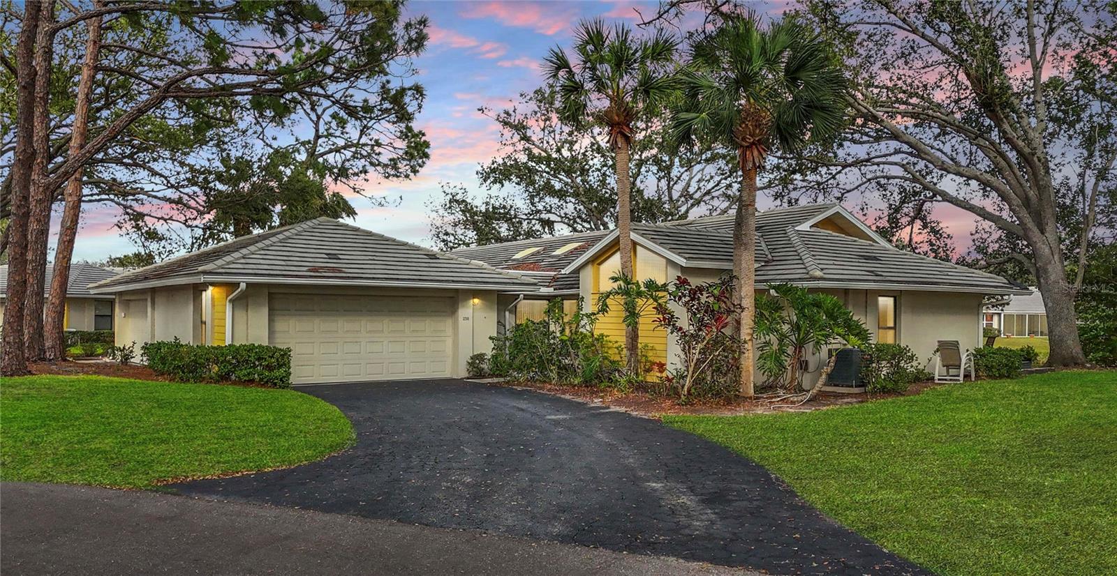 Welcome to your own slice of Florida paradise where stunning water views and effortless living come together in the highly sought-after community of Myrtle Trace at The Plantation. This vibrant three-bedroom, two-bath villa is more than just a home—it’s a lifestyle. Wake up to peaceful lakefront scenery and sip your morning coffee on the lanai as herons and egrets glide by.
The sun-drenched Florida room with floor-to-ceiling glass sliders blends indoor and outdoor living beautifully, while vaulted ceilings and skylights flood the home with warmth and natural light. The updated kitchen features wood cabinetry, solid surface counters, and stainless steel appliances—ready for your favorite culinary creations.
The spacious owner’s suite is a true retreat with dual vanities, a walk-in shower, and tranquil water views. The sparkling master bath features elegant crystal chandeliers that add a touch of luxury to your everyday routine.
A rare gem in the community, the third bedroom was once a patio or terrace—now transformed into a full bedroom, ideal for guests, a home office, or cozy hideaway. Just outside, a separate patio space offers the perfect spot to soak in the Florida sunshine or enjoy a cool shandy beneath the shade of the oaks.
Myrtle Trace is lined with majestic oak trees and charming brick roundabouts that give it a picture-perfect, tucked-away feel. The community offers a heated pool, a welcoming clubhouse, and year-round social events where neighbors truly become friends.
And when you’re ready to explore, you’re minutes from charming downtown Venice, beautiful Gulf beaches, shopping, dining, and the new Wellen Park entertainment district. The Plantation Golf & Country Club is just around the corner for world-class golf and amenities.
Whether you're relaxing poolside, catching sunsets on the lanai, or exploring everything the area has to offer, this home is the perfect place to make lasting memories. Don't miss out—schedule your showing today.