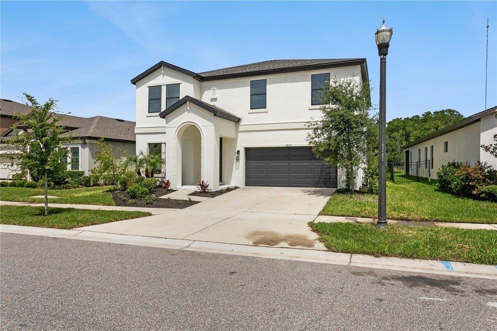 Photo of 12633 Shetland Walk Drive, Lithia, FL 33547 (MLS # O6425914)
