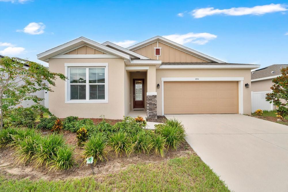Whether you are looking for a premium starter or a move in ready house. The 4 bedroom 3 bathroom "Emerald" by Richmond Homes will check all your boxes. This 2,260 SQFT 9 foot ceiling beauty, comes with an in-law suite which contains a private bathroom, flex lounge and a wet bar. Also the Emerald's split floor plan provides privacy for all family members young and old. While the main areas open floor plan of kitchen, family room and lanai create a space for lasting memories. In addition to this stunning model the owners have added upgrades to this property such as: main area Luxury Vinyl floors; Custom front door with decorative glass design; Pre-wired ceiling audio speakers; 4 panel glass lanai doors and more! Only built in 2023 this home sits in the bustling region of Haines City which will grow with you for years to come. In the heart of Central Florida you will be able to take advantage of all the attractions and adventures it has to offer. Now all we need for you to see it for yourself. Book a showing time today!!