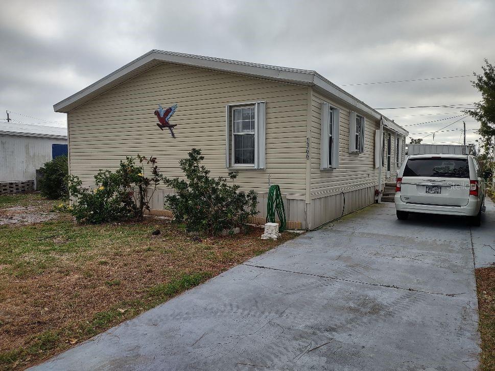 This is one of the rare finds in a 55 and older community. It has three bedrooms, two bathrooms, with large open living room, dining room and kitchen. This home is in a centrally located neighborhood with Stores, Doctors, Restaurants, Golf courses, Boating and only a few miles to the beautiful beaches on the Gulf of America. There is a club that you may join that has many activities, and for a small fee use the boat launch with the waters that lead to the Lemon Bay and to the Gulf. Come and enjoy our bit of paradise with us.