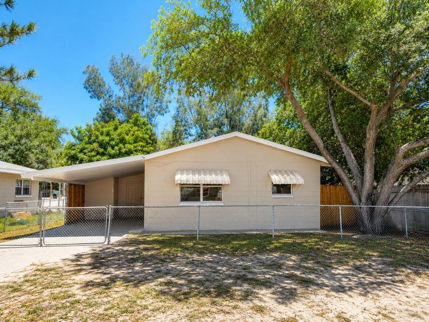Charming and cozy 2-bedroom, 1-bath block home with a carport and an oversized fenced-in backyard located in North St. Petersburg, just minutes from beaches, shopping, dining, hospitals, parks, and entertainment. Conveniently situated only 10–15 minutes from downtown St. Pete, 10 minutes from Madeira Beach and John’s Pass, 25 minutes from Tampa International Airport, and centrally located near Clearwater, downtown Tampa, and Busch Gardens.

This adorable home has been freshly painted inside and out and features tile flooring throughout, an updated kitchen with newer range/oven, renovated bathroom with newer vanity, and washer/dryer hookup. The massive double-sized backyard feels like your own private park — perfect for pets, entertaining, or relaxing outdoors. The property also offers plenty of parking space, including room for a boat or RV.

All prospective tenants must meet qualifying standards to be considered, including background check, credit check, employment and income verification, no prior evictions, and sufficient income requirements. 12-month lease available.