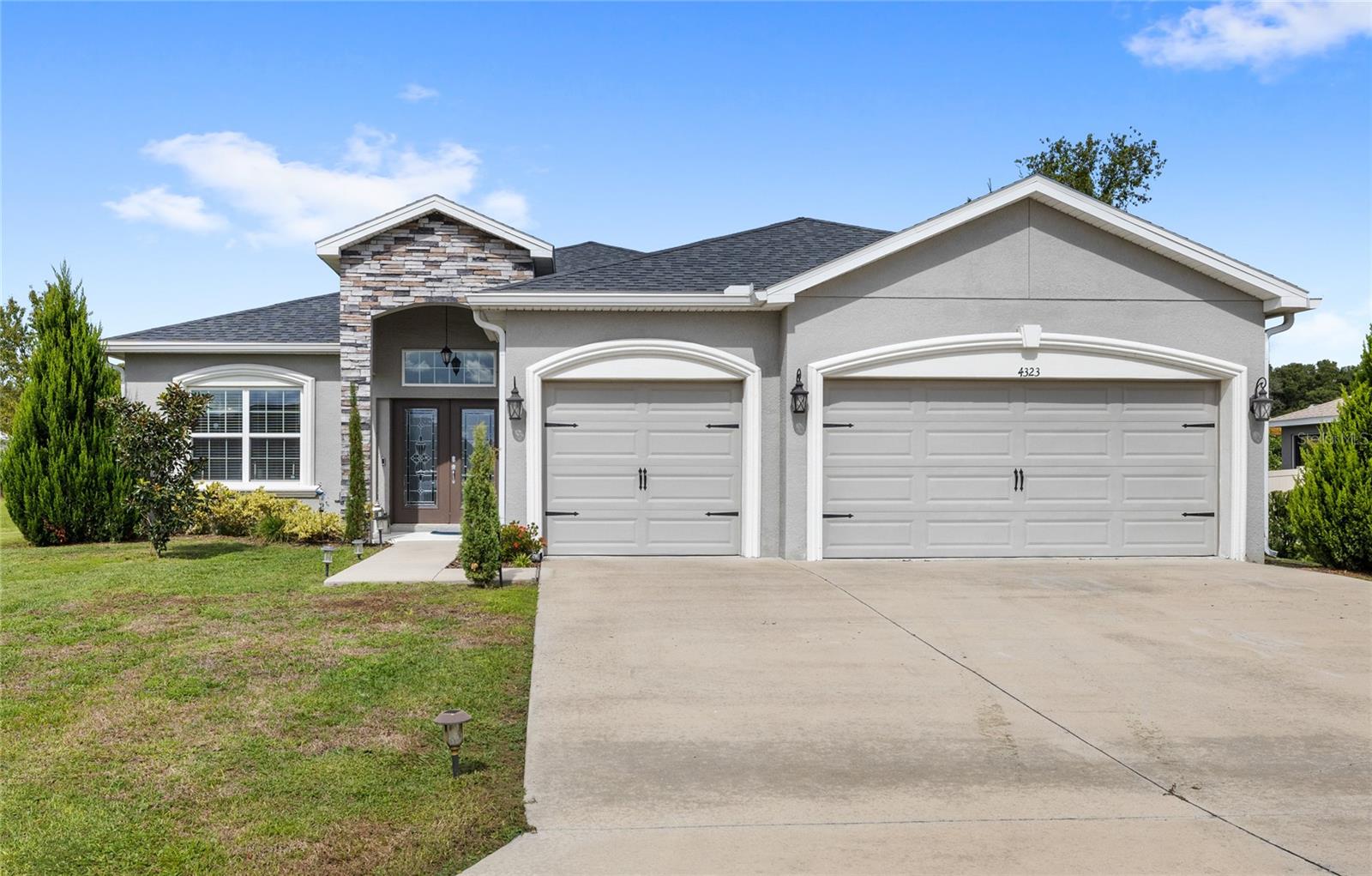 Better than New! Welcome to this 4 bedroom/3 bathroom home, 2,436 sq ft built in 2021 and located in the desirable community of Summercrest in Ocala! This well-maintained double door entry, 3-car garage home offers the perfect blend of comfort and modern style with Luxury Vinyl Plank flooring throughout most of the home. Featuring an open-concept layout ideal for everyday living and entertaining, this residence includes a spacious Primary Owner’s Suite with beautiful new tile flooring and a tastefully updated ensuite bathroom. The Flex room with glass double doors is perfect as an office, den, art studio or a lounge area. Step outside to a large backyard with a spacious patio — perfect for entertaining, grilling, or relaxing under the Florida sun. The fully fenced yard offers privacy and plenty of room for outdoor fun. Summercrest residents enjoy a peaceful, tranquil community setting with easy access to shopping, dining, medical centers, and the best that Ocala has to offer, including parks, golf, and outdoor recreation. This move-in-ready gem combines style, convenience, and value. Schedule your private showing today!