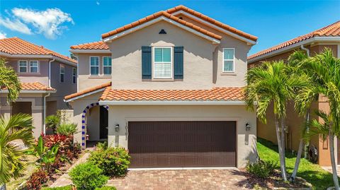 Photo of 10193 Grand Oak Circle, Madeira Beach, FL 33708 (MLS # TB8499854)