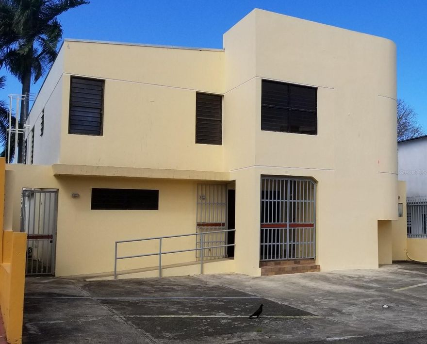The subject property is improved with a two-story office building with a total effective area of 3,812 square feet approximatelyband other facities erected over a parcel land of 341.78 square meter site. Zoning is RI Two level building.  The property located at the front of 3rd street back to West Main Avenue in the Sierra Bayamon Developement, Street connects to north with State Road #29 which in turns connect to South of with State Road #2 also connecting with Bayamon Central District.
Among these routes commercial locals, retail stores, gas stations, mini markets, fast foods, restaurants, post office, hotels, guest houses, mid rise condos, pharmacies, auto repair shop, churches and hardware stores could be found. The access to neighborhood is considered well with connection to State Road #2, State Road #167, and Expressway #22 which are most important roads of the area. The entire area is served by public sewage, electricity and facility for cable internet connection. Two levels consist of First Level - 1,867 square feet, 
Second Level area 1,945 sqare feet. First Level has open space, two bathrooms, office space, storage.  Second level has kitchen, reception area, two bathrooms, and 3 rooms, one large open space all with ceramic tiles.  Excellent location in Bayamon Municipality.