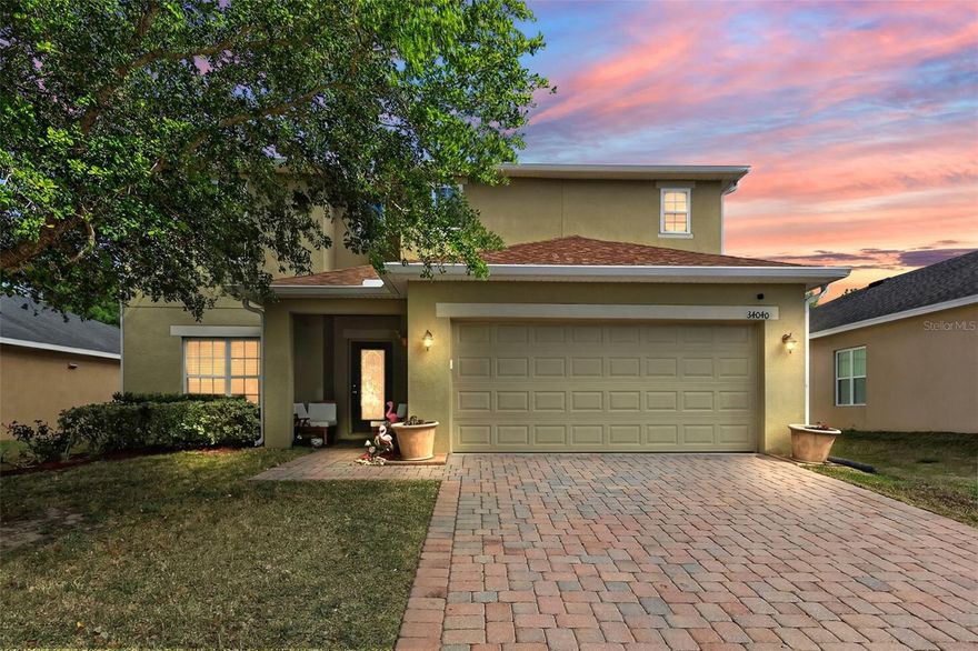 Welcome to the community of Sorrento Springs, offering RESORT-STYLE AMENITIES including a sparkling POOL, clubhouse with fitness center, picnic and grilling areas, basketball and tennis courts, and scenic conservation areas—all within a 24-hour guard-gated neighborhood. Golf enthusiasts will love having the 18-hole Eagle Dunes Golf Course right within the community.

This spacious home features 5 BEDROOMS and 3 FULL BATHROOMS, along with a FLEX SPACE and UPSTAIRS LOFT, including a convenient first-floor bedroom and full bath—perfect for guests or MULTI-GENERATIONAL LIVING. From the moment you arrive, you’re greeted by a charming, cozy front porch.

Step inside to a bright and airy floor plan filled with natural light. A versatile FLEX SPACE at the front of the home can serve as a den, dining room, home office, or whatever suits your lifestyle. The open-concept layout seamlessly connects the kitchen, casual dining area, and family room, making it ideal for both everyday living and entertaining. The kitchen boasts 40-inch cabinetry with crown molding, granite countertops, and a closet pantry.

Upstairs, you’ll find a SPACIOUS LOFT, laundry room, and an expansive primary suite featuring an en-suite bath with dual sinks, a separate shower, soaking tub, and a large walk-in closet. Three additional bedrooms and a full split bathroom with dual sinks complete the upper level.

Enjoy outdoor living at its best—whether sipping morning coffee, watching sunsets, enjoying the fire pit, or hosting gatherings—on the large half-court, Shark Coated patio overlooking a fenced backyard with a serene setting that enhances privacy and tranquility.

Additional updates and features include: NEW ROOF (2025), irrigation system, new dishwasher (2025), new window screens, and Shark Coating in the garage and downstairs bedroom.

With a functional layout and convenient access to the 429 toll road, this home offers an easy commute to Orlando, Sanford, and Lake Mary. Don’t forget to view the 3D tour and schedule your showing today!