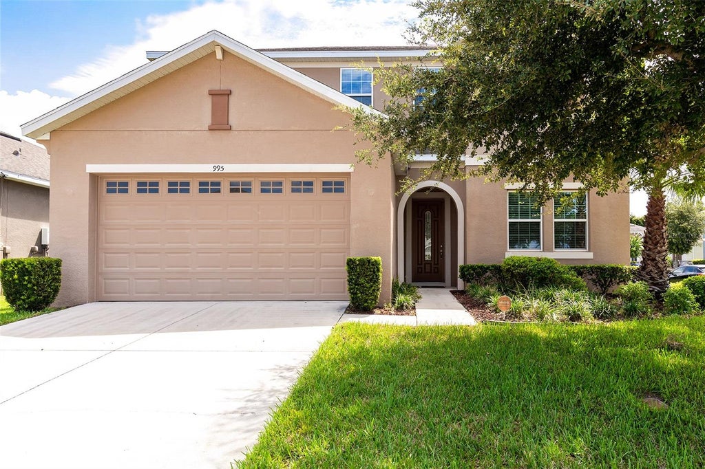 Photo of 995 Karst Tree Lane, Apopka, FL 32703 (MLS # O6436183)