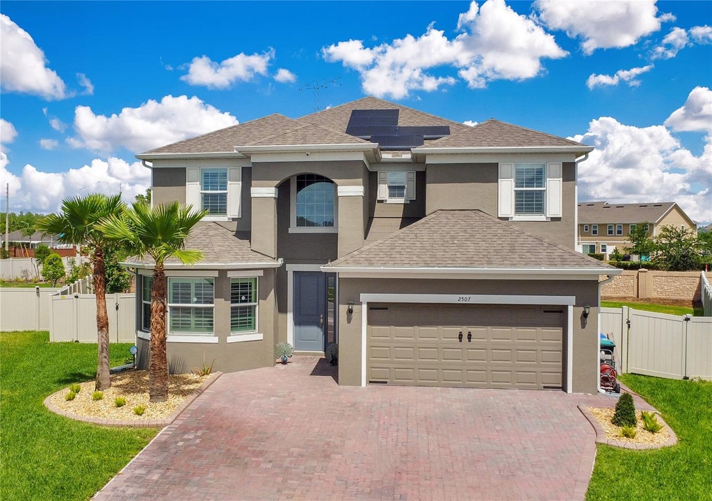 Photo of 2507 Rush Bay Way, Orlando, FL 32824 (MLS # O6442593)