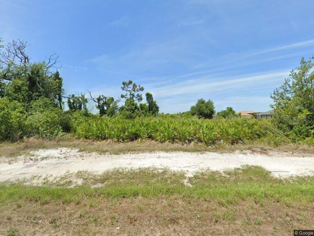 Photo of 13417 Alocasia Lane, Port Charlotte, FL 33981 (MLS # C7511197)