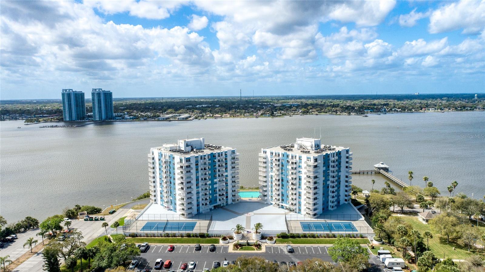 Quaint 1 bedroom, 1 1/2 bathroom with assigned, 1 car parking underground. Brilliant river views and sunsets from your private balcony! Master bedroom offering that same view with his and hers custom walk in closets. Plenty of storage and beautiful bamboo flooring throughout the home. Bayshore Bath and Tennis Club, amenities are some of the best in the area. Heated Riverfront pool, fishing pier, tennis courts, women's and men's exercise rooms, steam and saunas, billiards, game room, library and club room. All of this blocks from the beach, shopping and restaurants. Make it yours by adding your own modern touches! Square footage from tax rolls. All info intended to be accurate but can't be guaranteed.