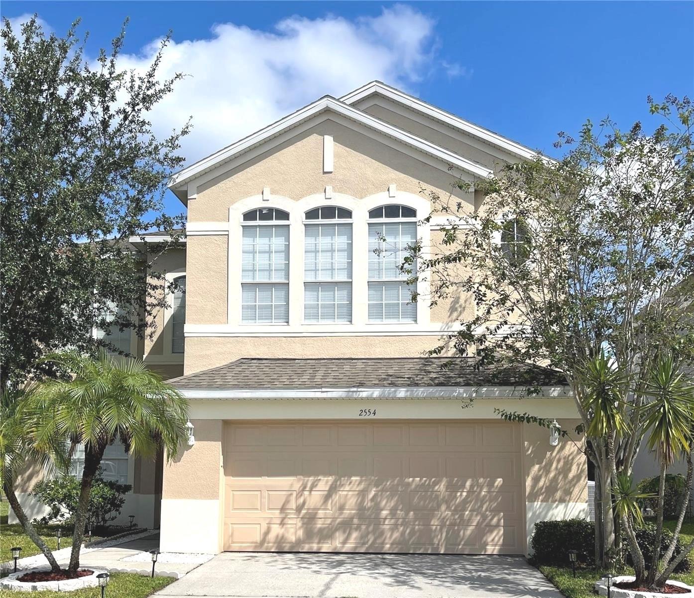 Brand new carpet, 2023 washer and dryer, 2023 stove/ lights and toilets... This stunning property is located in Orlando, Florida and boasts just under 3000 square feet of living area. The home features a large two-story, four bedrooms and two and a half baths. The formal living and dining areas are perfect for entertaining guests. The kitchen includes recessed lighting, a breakfast bar, and a dinette overlooking the family room. The huge master bedroom has a large closet, dual sink vanity, garden tub with a separate shower in the master bath. All bedrooms and a large open bonus/play area are upstairs to keep everyone busy. The house is in move-in condition and has rock-solid block construction with standard lot size and rear water view. This beautiful home is conveniently located near schools, shopping, and dining. It is also just minutes away from major freeways making easy access to Walt Disney World, Sea World, Universal Studios, Downtown Orlando, Orlando International airport and the new Medical City!