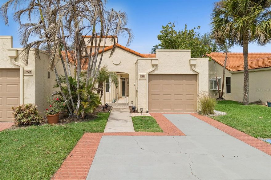 The home has been completely redone inside with a brand new kitchen featuring quartz countertops, updated cabinetry, and a clean modern look that feels much more high-end than expected. Both bathrooms have also been fully renovated with new tile, new vanities, and updated finishes. Brand-new tile flooring and baseboards run throughout the entire home, creating a consistent feel from the moment you walk in.

One of the biggest surprises when you step inside is how much larger the home feels in person. Being a corner unit makes a huge difference—there’s noticeably more natural light than most units here, and the layout feels more open while still offering privacy. The sunroom really stands out with a cedar wood-paneled ceiling and two separate sliding glass doors leading into it. It works perfectly as a second living area, home office, or a bright space to relax.

Out back, the unit opens up to a large area of green space, which is not typical at this price point. In the front, there’s also a private gated courtyard patio that offers a quiet outdoor space away from traffic and busy streets. A 1-car garage plus an additional exterior storage room provides more space than many similar units nearby.

The location is another major highlight of this area of Melbourne. You’re just minutes from the Eau Gallie Arts District, a historic part of the city known for its art galleries, local coffee shops, murals, and small restaurants along the river. It’s widely known as one of the more fun and walkable areas on the Space Coast, especially for those who enjoy an active yet laid-back lifestyle.

If you’re looking for something that feels brighter, more updated, and more private than the typical unit in this price range, this one is definitely worth seeing in person.