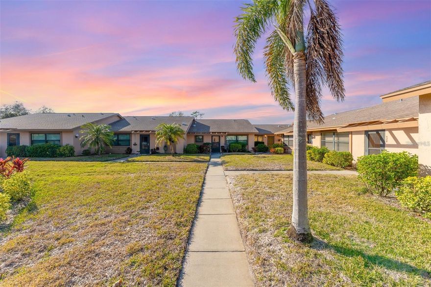 Move-In Ready Condo – 15 Minutes to Anna Maria Island! This beautifully updated 1-bedroom, 1-bath condo in the sought-after Meadowcroft South community offers the perfect blend of comfort, convenience, and coastal living. Recent upgrades include a new A/C, flooring, washer, dryer, and refrigerator, ensuring a move-in-ready experience. The spacious open-concept layout features cathedral ceilings, making the living area feel even more open and airy. Easy-maintenance vinyl flooring runs throughout the main areas, while the well-appointed kitchen provides plenty of storage. A convenient in-unit washer and dryer add to the home’s practicality and there is 1 assigned parking space. The large enclosed lanai offers a peaceful retreat, complete with pull-down blinds for added shade and privacy. Meadowcroft South is a well-maintained 55+ community with a beautifully landscaped pool area, spa, and covered cabana, providing a relaxing space to unwind and connect with neighbors. Just 15 minutes from the stunning beaches of Anna Maria Island, this home is also close to Robinson Preserve, De Soto National Memorial, and downtown Bradenton’s shops, restaurants, and entertainment. Whether you’re looking for a full-time residence or a seasonal retreat, this condo offers a low-maintenance lifestyle in an ideal location. Schedule your private showing today!