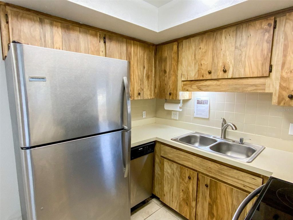 Photo of 6036 Chesham Drive #5, New Port Richey, FL 34653 (MLS # TB8484100)