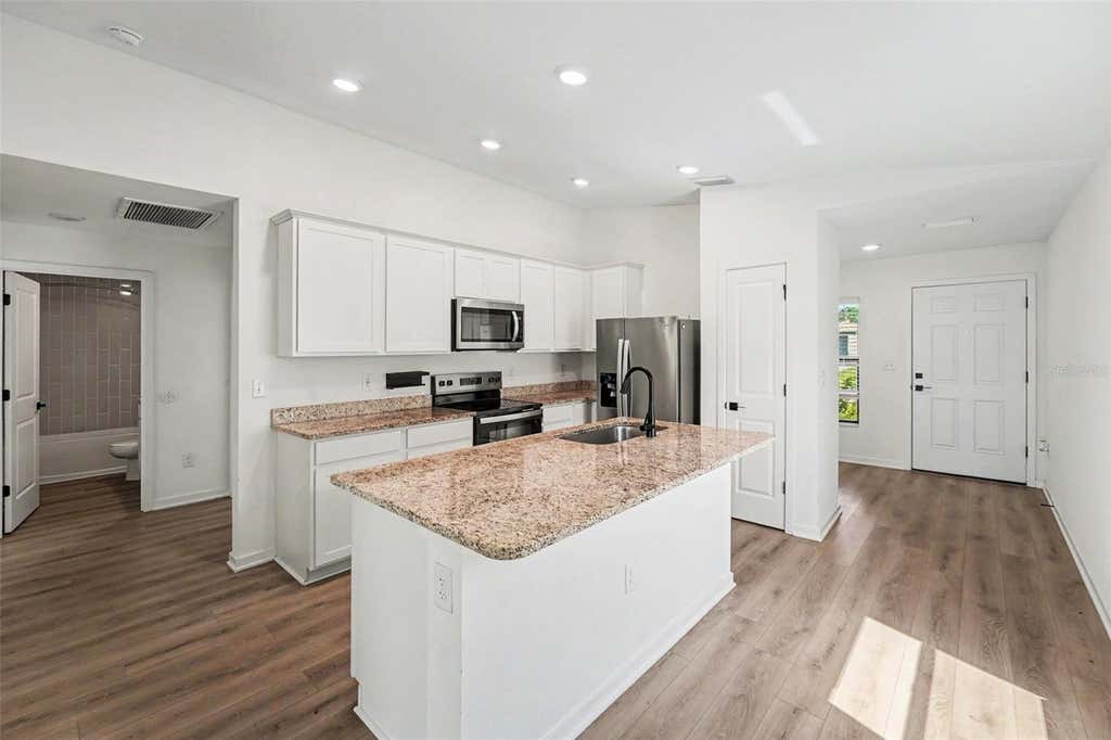 Photo of 5669 Flotilla Avenue, Tampa, FL 33619 (MLS # A4697077)