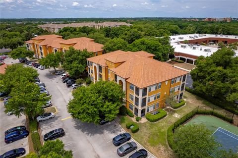 Photo of 6171 Metrowest Boulevard #306, Orlando, FL 32835 (MLS # O6347079)