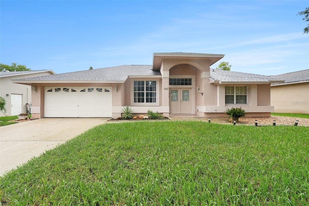 Photo of 907 Brittany Park Boulevard, Tarpon Springs, FL 34689 (MLS # O6448925)