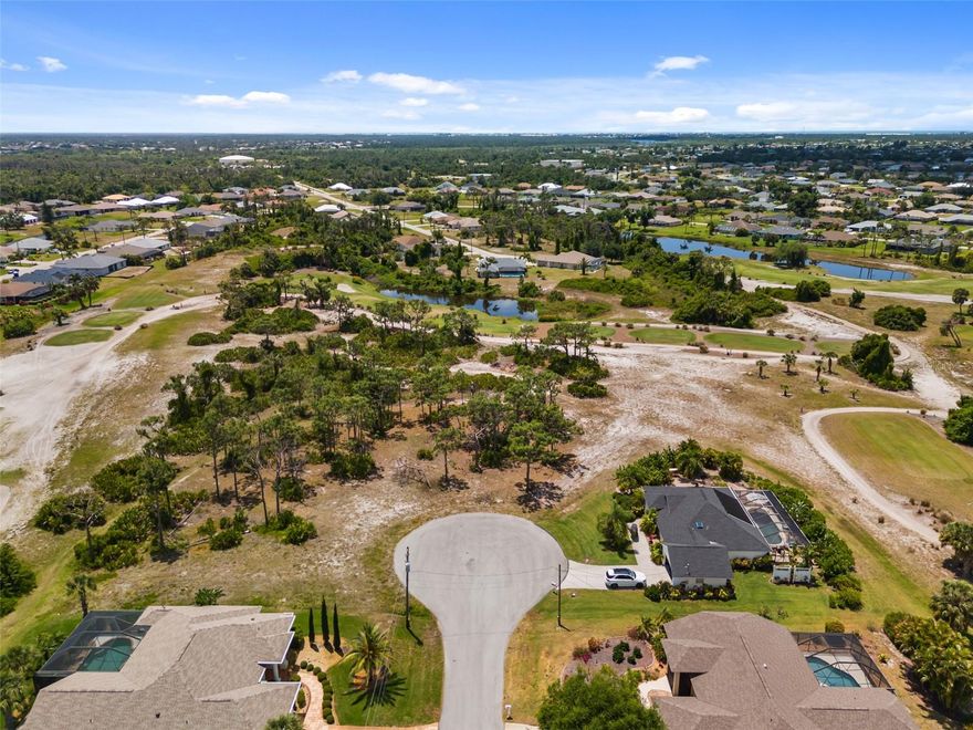 Don't miss out on this rare opportunity to own a huge 1/2 acre double lot in the highly desired community of Rotonda West! Situated privately at the end of a cul-de-sac, with southern exposure in the back of your future dream home! This lot is on the Pinemoor Golf Course, and overlooks the 5th hole, with views of the 6th and 15th holes as well. This quiet, friendly community is just a short drive to the pristine Gulf beaches of Englewood, Manasota Key, and Boca Grande. Enjoy golfing, world-class fishing, boating, restaurants, and shopping. Rotonda West is a golfer's paradise, boasting championship golf courses within the community, and even more within a short drive! For nature enthusiasts, Rotonda West does not disappoint, with its distinctive natural beauty comprised of scenic lakes and canals, and the abundant wildlife that makes the community's 30 miles of canals their habitat. Come build your new Florida dream home! This lot is in the desired X-flood zone.