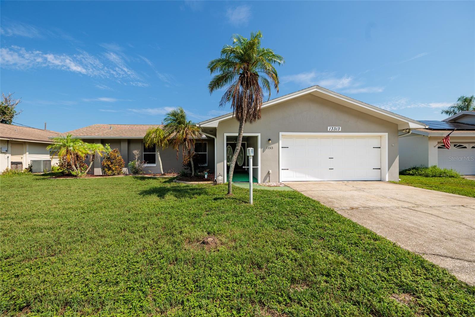 Charming solid block 3 bedroom, 2 bath, 2 car garage home in the heart of Seminole! This home is high and dry , so no flood insurance required and no HOA. The Split bedroom floor plan is perfect for both family living and entertaining. The spacious porch is perfect to sit and enjoy the beautiful Florida weather. The huge fenced backyard is huge with plenty of room for a pool! Situated in a quiet and established neighborhood, with top rated schools and just minutes to award winning beaches as well as Seminole City Center shopping and restaurants! This home is waiting for your special touches and updates making it your own! You do not want to miss this opportunity to own this solid home in beloved Seminole! Seller is motivated! Priced to sell! Call today to see this wonderful home!