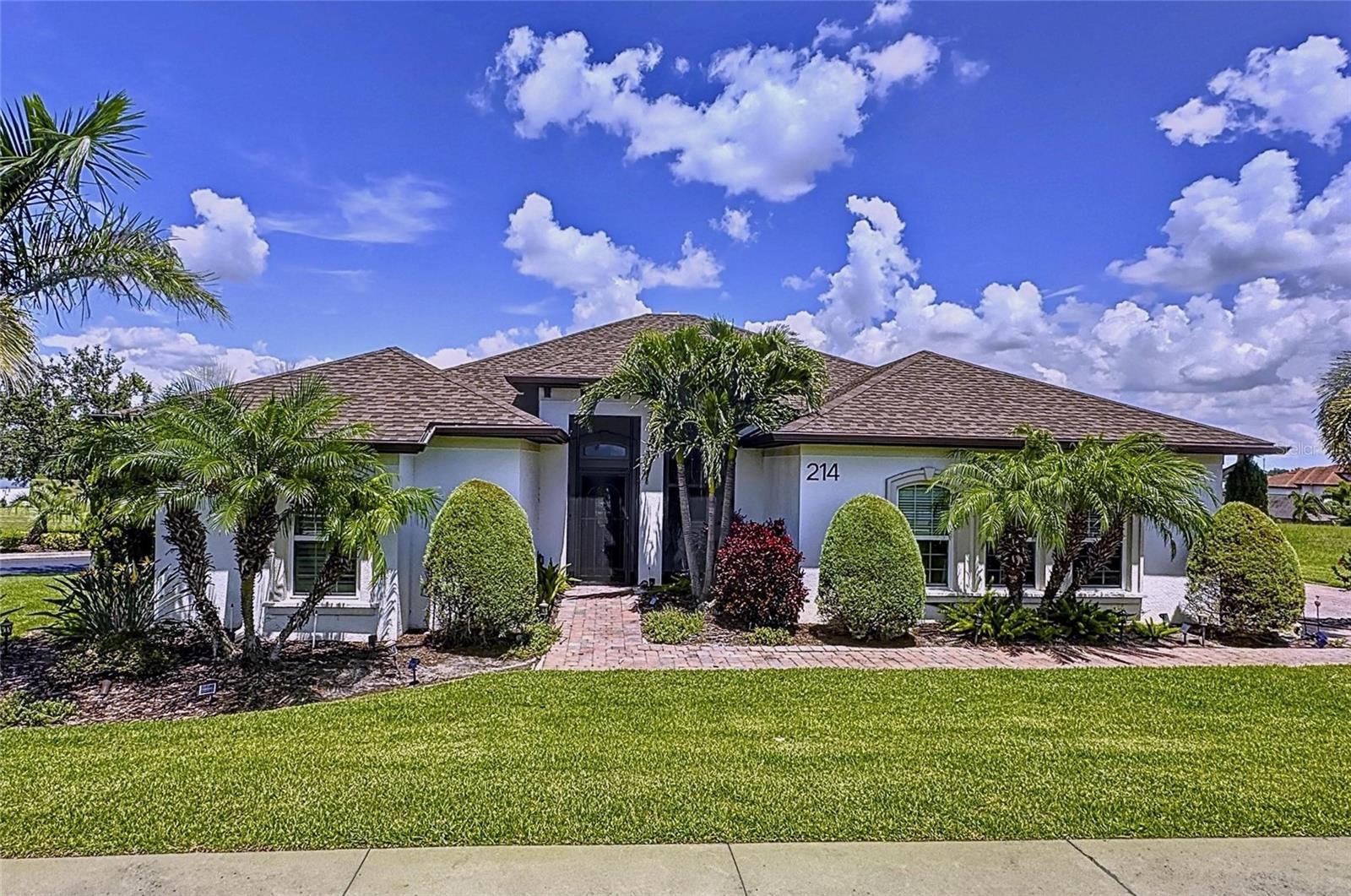 Enjoy serene lakeview living in this stunning 4-bedroom, 2.5-bath home boasting 1,934 sq ft on a generous 0.3-acre lot. Step outside to your private pool and take in breathtaking views of Lake Alfred—a perfect backdrop for morning coffee or sunset swims. Inside, the spacious floor plan offers comfort and versatility, with room for family, guests, and entertaining. The 2.5 baths provide added convenience, while the expansive lot gives you space to relax, garden, or host gatherings. The luxurious gated community of Water Ridge offers many amenities such as a fitness center, community pool, tennis and pickleball courts. Ideally located just minutes from Interstate 4, this home offers easy access to Orlando, Tampa, and all of Central Florida’s attractions, while still embracing the peaceful charm of lakeside living.