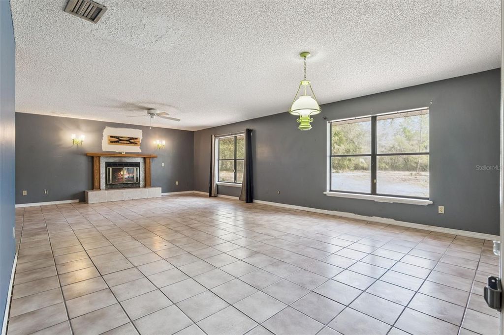 Photo of 590 S Lawton Avenue, Orange City, FL 32763 (MLS # O6383737)