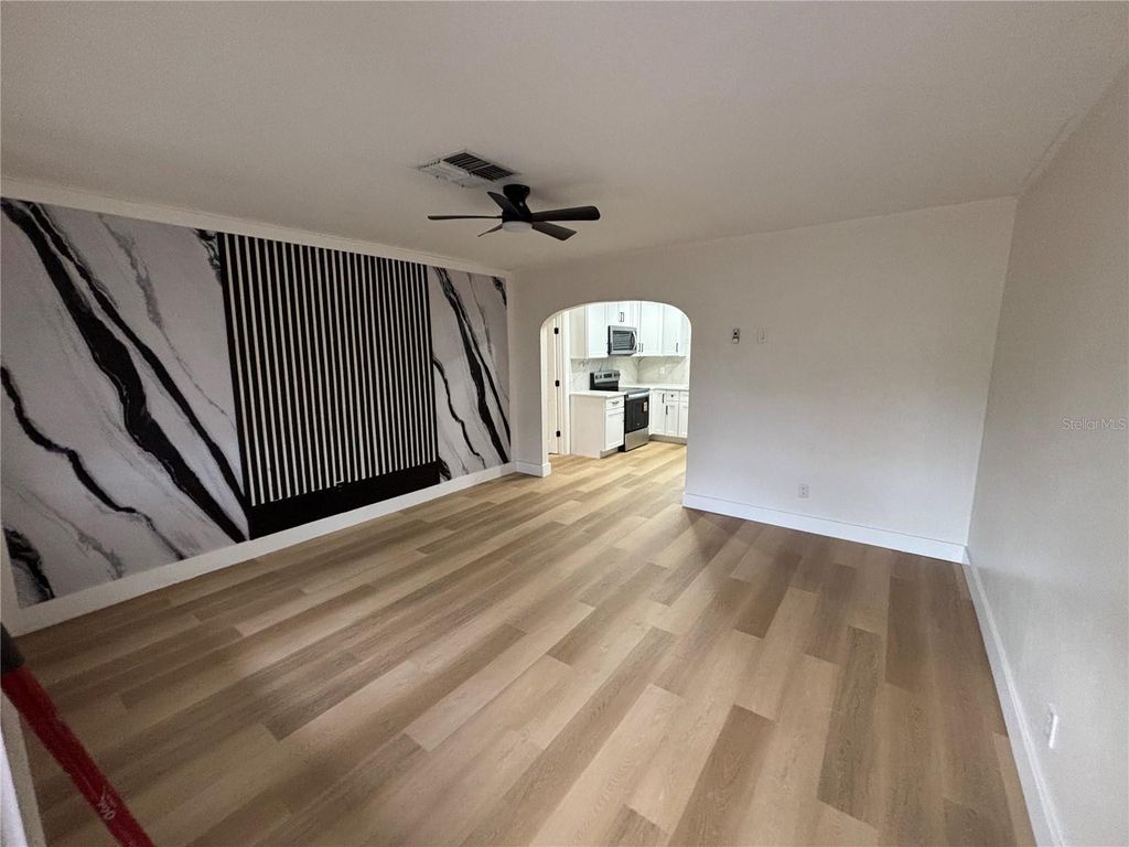 Photo of 1215 New York Avenue, Palm Harbor, FL 34683 (MLS # TB8454935)