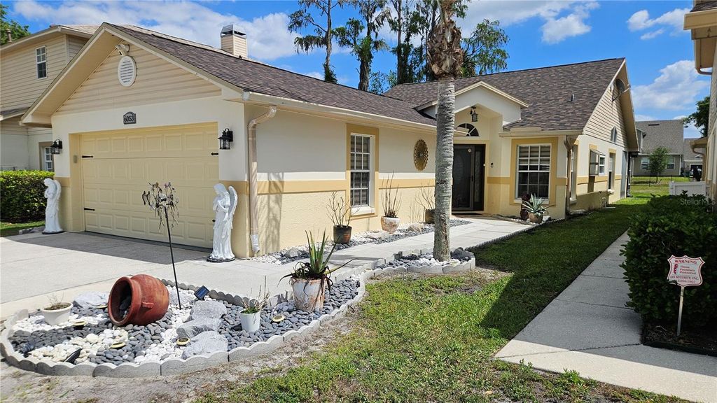 Photo of 6053 Gentle Ben Circle, Wesley Chapel, FL 33544 (MLS # TB8498749)