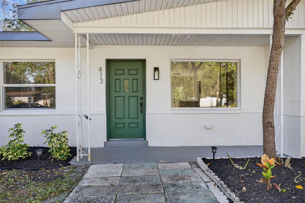 Photo of 413 Country Club Drive, Oldsmar, FL 34677 (MLS # O6396122)