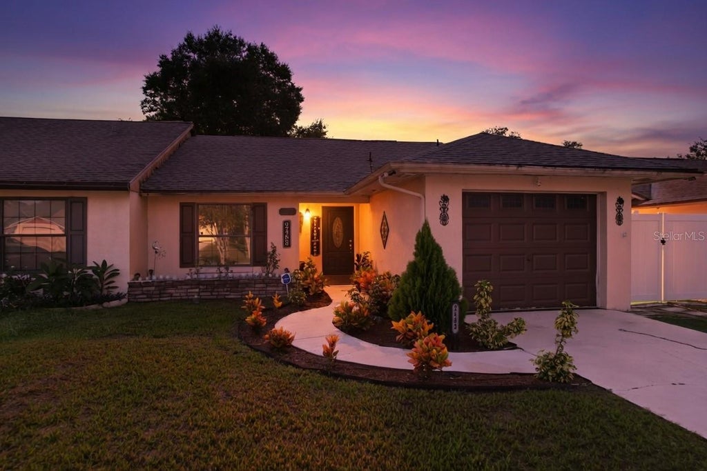 Photo of 2483 Long Meadow Way, Orlando, FL 32817 (MLS # O6440888)