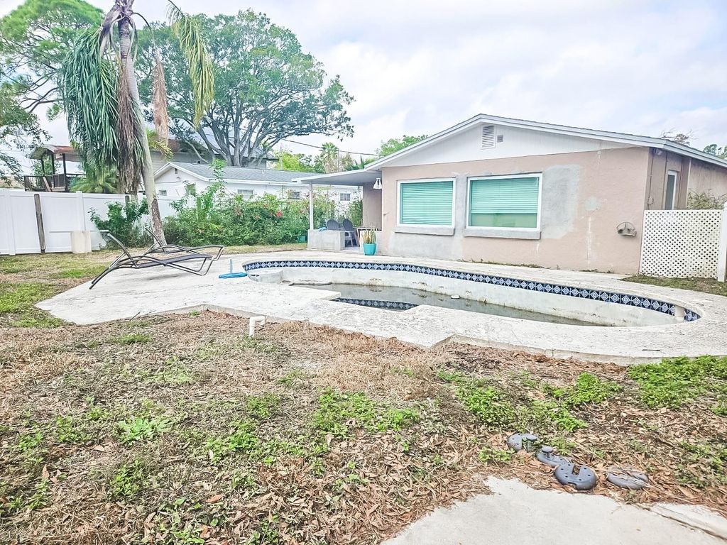 Photo of 232 84th Avenue NE, St Petersburg, FL 33702 (MLS # TB8455598)