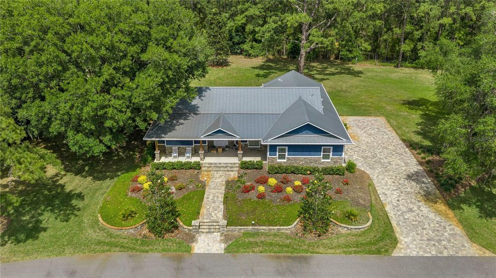 Photo of 5927 NE 62nd Court Road, Silver Springs, FL 34488 (MLS # OM723437)