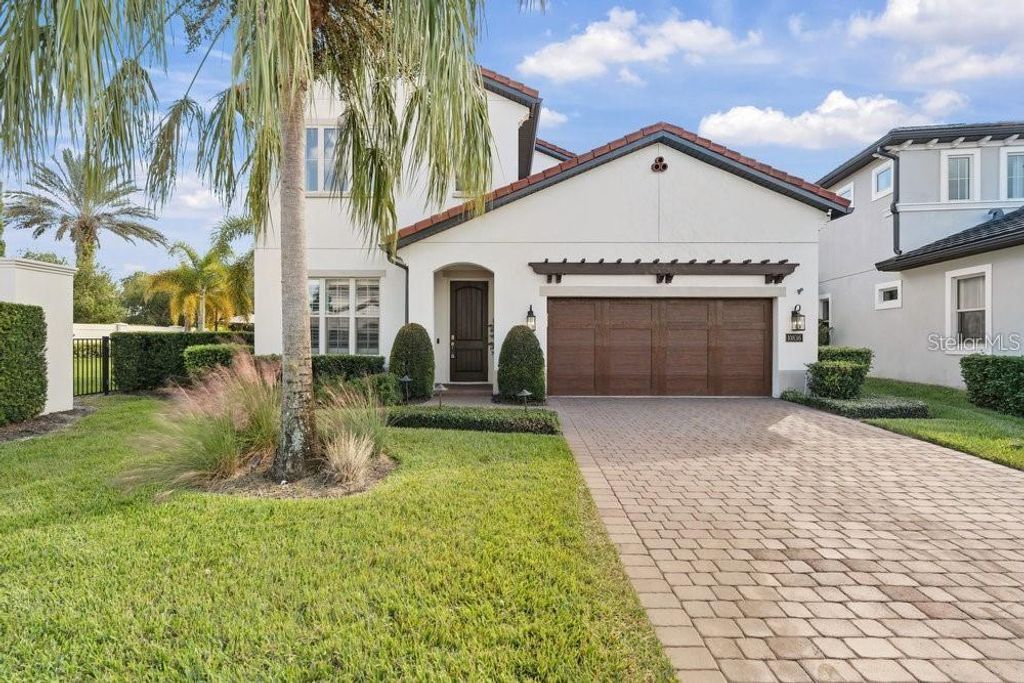 Photo of 10836 Royal Cypress Way, Orlando, FL 32836 (MLS # S5139707)