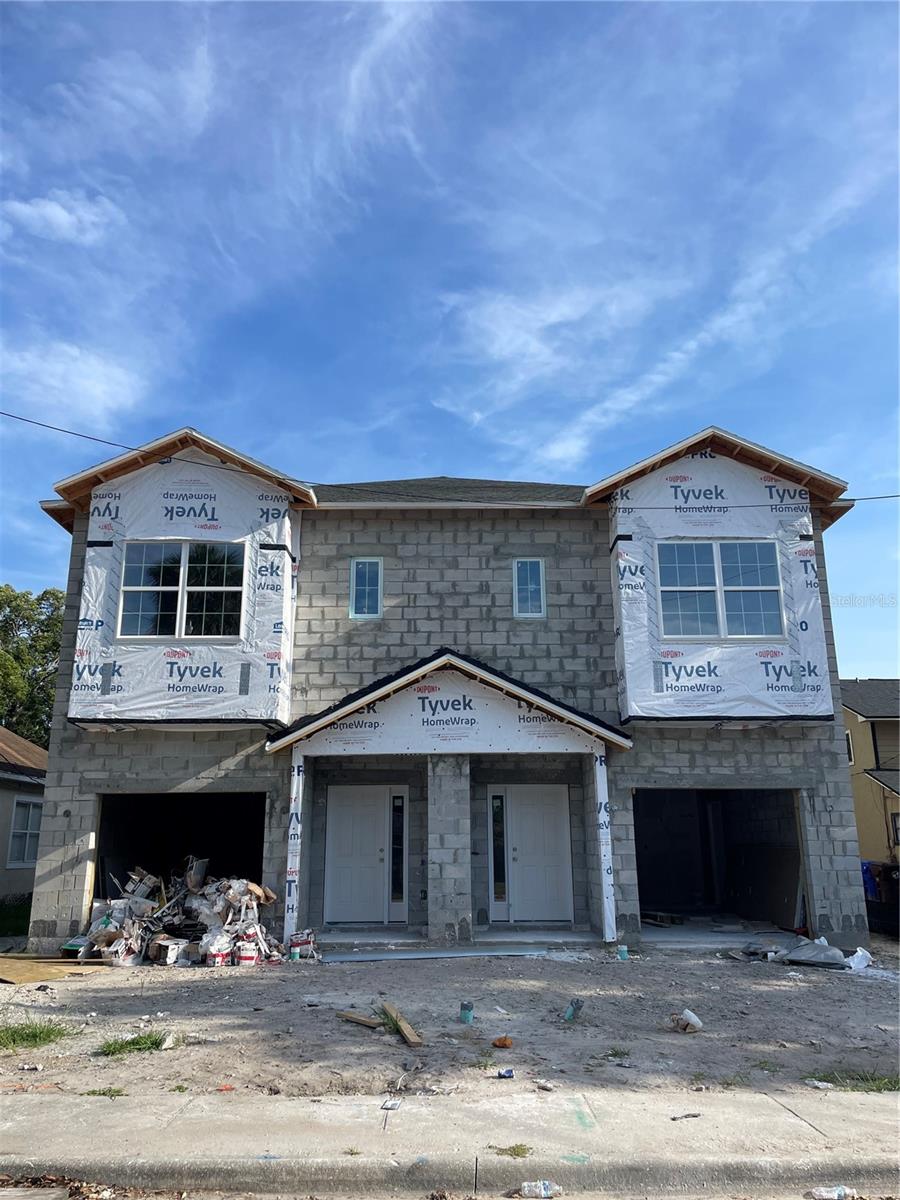 Under Construction. Brand new construction 2 story duplex with 100% block frame structure in the beautiful City of Kissimmee! Rare investment opportunity in COK! NO HOA! NO CDD! NO FLOOD ZONE!
Each unit features 1,889 sqft of living area with 3 bedrooms and 2.5 bathrooms. All bedrooms and full bathrooms are located upstairs with a convenient half bathroom on the 1st floor. The kitchens will include all brand-new stainless-steel appliances as well as stone counter tops and a walk-in pantry. The spacious Master Suite is 18ft by 18ft and boasts a large walk-in closet, a 2-sink vanity and a separate shower and Roman Tub. Each unit also has a one car garage that offers extra storage space with additional parking available on the separate driveways. This property is nestled right within the city limits of Kissimmee and is just minutes away from the Historic Downtown Kissimmee. Immerse yourself in the historic charm and vibrant local culture, featuring a variety of family-owned shops and restaurants. Downtown also hosts other amenities such as a library, Civic Center and Lakefront Park which are all less than a 5-minute drive away. The HCA Florida Osceola Hospital and Sun Rail train station are also nearby just less than 5 minutes away.