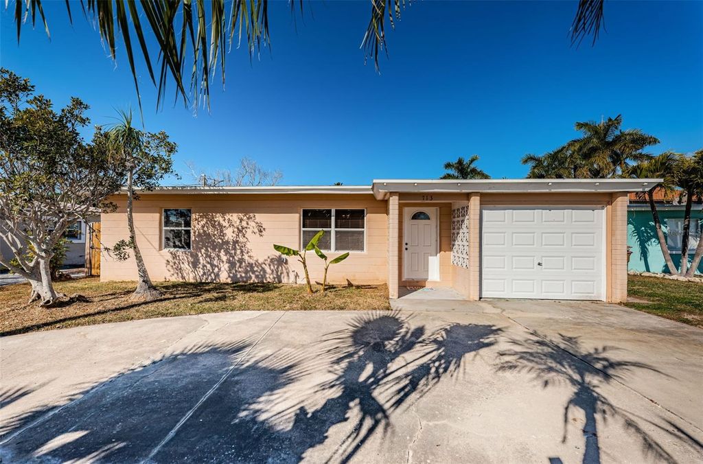 Photo of 713 Pruitt Drive, Madeira Beach, FL 33708 (MLS # TB8475601)