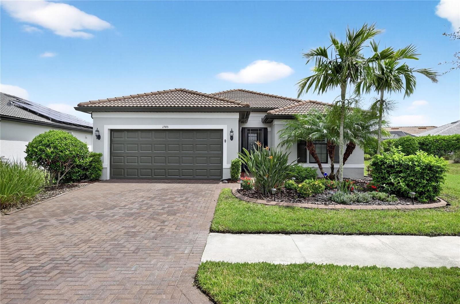 Welcome to 1745 Hyssop Loop, located in the desirable Del Webb Cypress Falls at The Woodlands, a 55+ active adult gated community offering resort-style amenities and a vibrant, social lifestyle. This spacious 1,997 SQFT Summerwood model features 3 bedrooms, 2 bathrooms, and a large den, all with attractive curb appeal. Inside, you'll find an inviting foyer, a guest bedroom with access to a full bath that includes an executive-height vanity, quartz countertops, and upgraded tub-to-ceiling tile. A versatile den provides the perfect space for a home office or additional guest room. The open-concept living area is ideal for entertaining, with a beautifully appointed kitchen offering a large extended island, 42" upgraded bright cabinetry, a premium appliance package, and quartz countertops. The full-size laundry room includes ample shelving for storage. Step outside to a covered lanai overlooking a peaceful lake — perfect for relaxing or hosting gatherings. The spacious primary suite also enjoys lake views and features a luxurious en-suite bathroom with dual sinks, a frameless glass shower, a soaking tub with floor-to-ceiling upgraded tile, quartz counters, and a large walk-in closet. The extended 2-car garage offers a 4' extension, high ceilings, a utility sink, pull-down screen, epoxy floors, and plenty of room for storage. As a resident of Cypress Falls, you’ll enjoy access to a clubhouse, resort-style pools, a fitness center, tennis and pickleball courts, bocce ball, horseshoes, and a full calendar of social events coordinated by a full-time activities director. This is low-maintenance, active community at its finest — come see what makes this home and community truly exceptional!