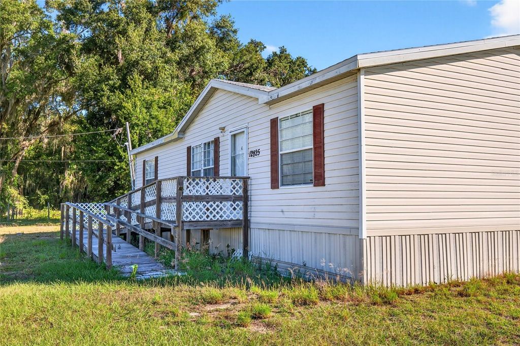 Photo of 12825 SE 115th Avenue, Ocklawaha, FL 32179 (MLS # OM712291)