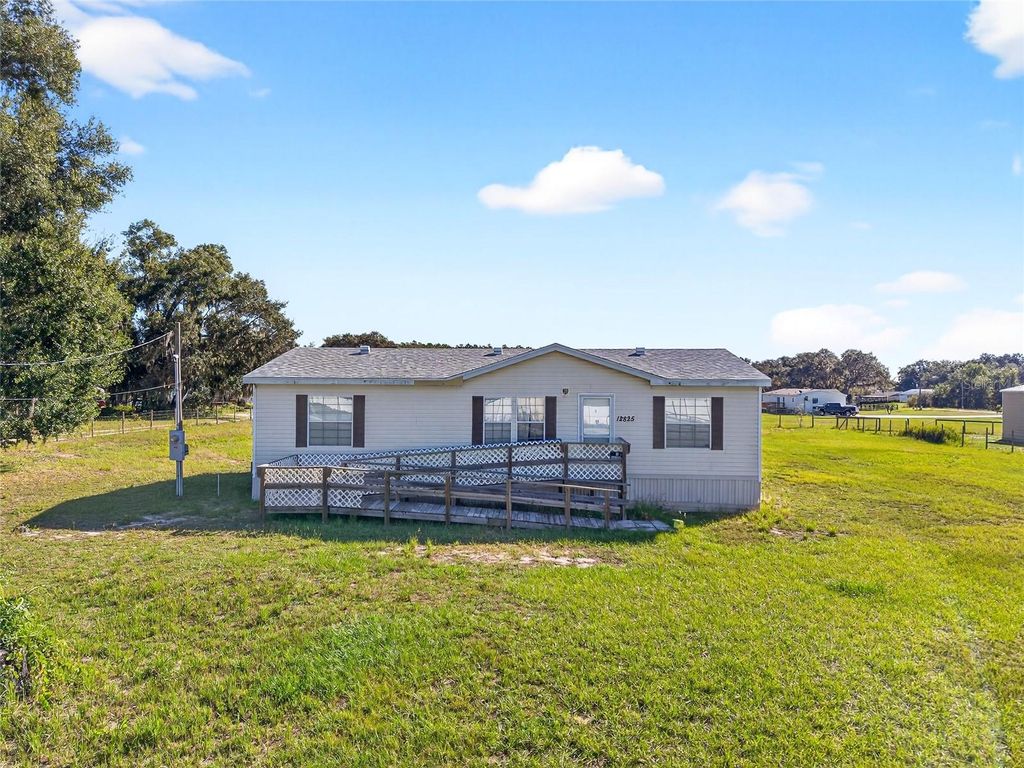 Photo of 12825 SE 115th Avenue, Ocklawaha, FL 32179 (MLS # OM712291)