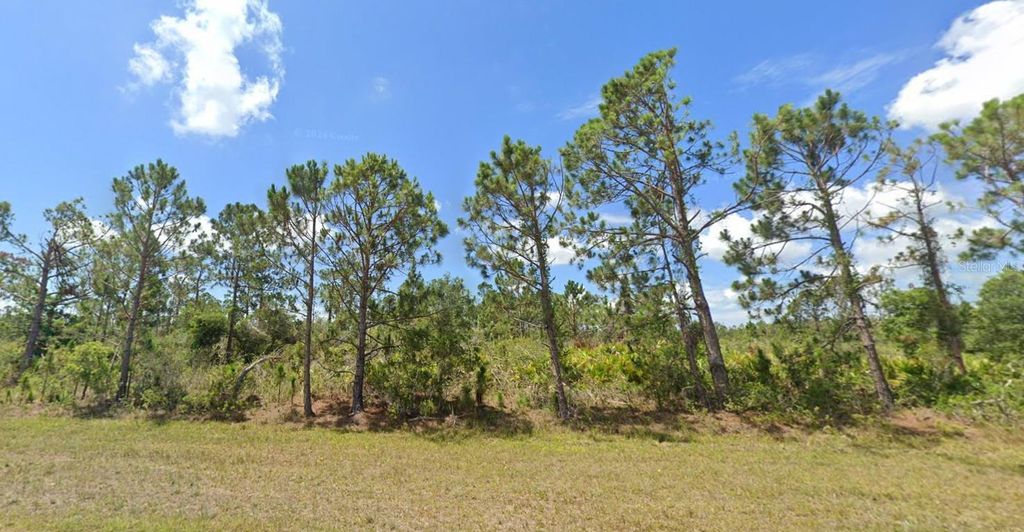 Photo of 12149 Gisinger Boulevard, Port Charlotte, FL 33981 (MLS # C7515008)