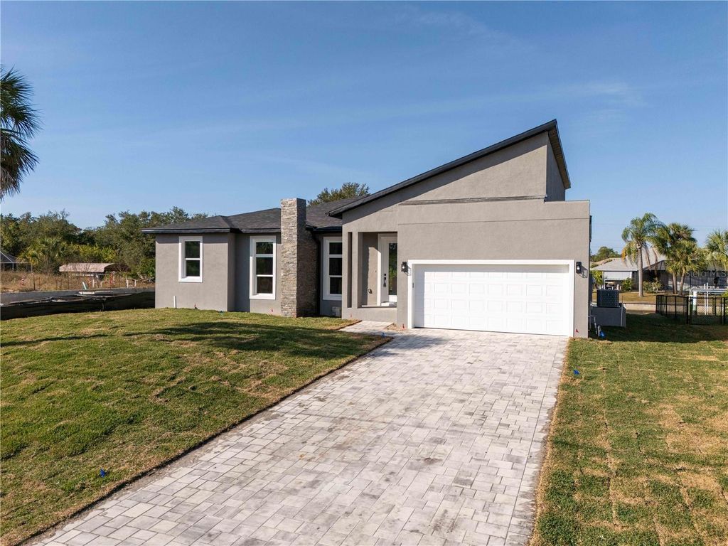 Photo of 15 Ramblewood Street, Port Charlotte, FL 33953 (MLS # O6366373)