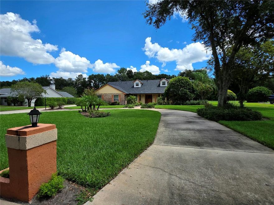 Welcome home to unlimited potential and space. This 4-bedroom, 3-bath residence is your chance start designing and adding your personal touches. The formal dining and living room is perfect for hosting holiday gatherings before cozying up by the wood-burning fireplace in your spacious family room. Step outside onto your oversized, 1+ acre private oasis where the possibilities are endless for gardening, games, or even your own dream landscape. You'll love relaxing by the screen-enclosed pool on your private lanai. And the location is prime, you’re minutes from everything: top schools, medical facilities, shopping, dining, Downtown Sanford, Lake Mary and all major highways. This is more than a home; it's a lifestyle waiting to be claimed. Don't wait, call today for your private showing before it's gone!