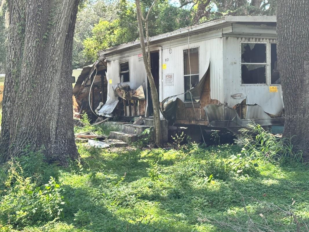 Investor Special – Land Value!
The property experienced fire damage and is being sold strictly as-is, for land value.
Fantastic location with quick access to I-4, I-75, and I-275. Just 10 minutes from Downtown Tampa, Ybor City, and the Channel District. Publix, Hard Rock Casino, the Florida State Fairgrounds, are only five minutes away. Perfect opportunity for investors, builders, or anyone looking for a lot to place a new manufactured home or explore redevelopment potential. Buyer to verify zoning, utilities, and all intended uses. No repairs or warranties will be made by the seller. Bring your vision and make this property your next project!