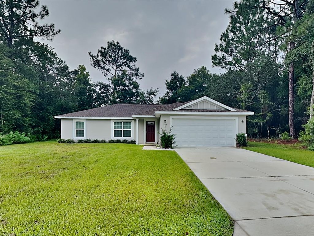 Photo of 904 W Rum Place, Dunnellon, FL 34434 (MLS # O6398945)