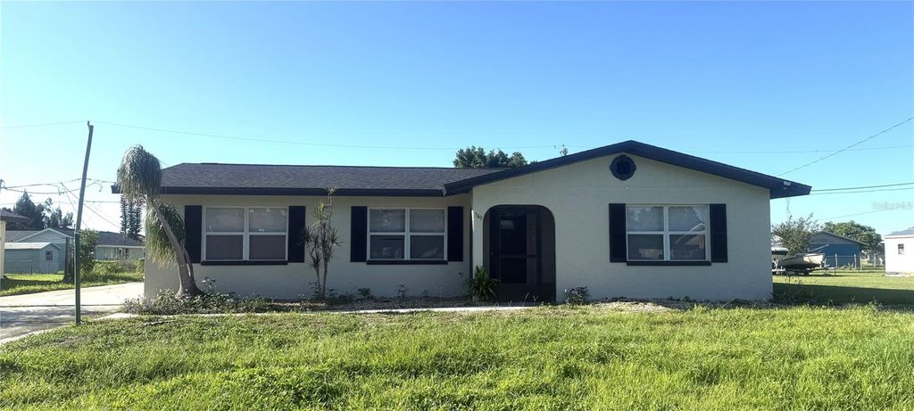 Photo of 549 Lakemont Avenue NW, Port Charlotte, FL 33952 (MLS # C7515443)