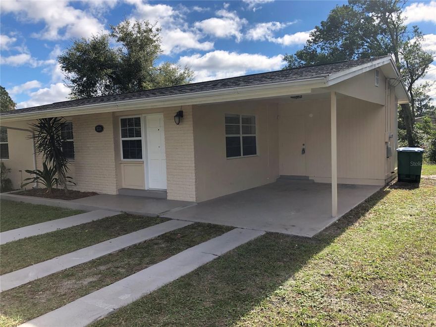 Located in the heart of Deltona, this 3 bedroom, 1 Bath home is in excellent condition. Upgraded tile flooring throughout, this home has 943 sqft. but feels much larger and sits on an over-sized corner lot. This home was remodeled a few years ago and boasts blinds throughout, spacious kitchen with stainless steel appliances, wood cabinets, granite countertops and a contemporary backsplash. Huge laundry room with washer and dryer included. Nice and modern bathroom with beautiful tile and vanity. Screened back porch with access to a huge backyard to enjoy the outdoors. One carport. Located just minutes from I-4, the 17, and the 415. Ready to move in. You won't be disappointed! Equal Housing Opportunityl.