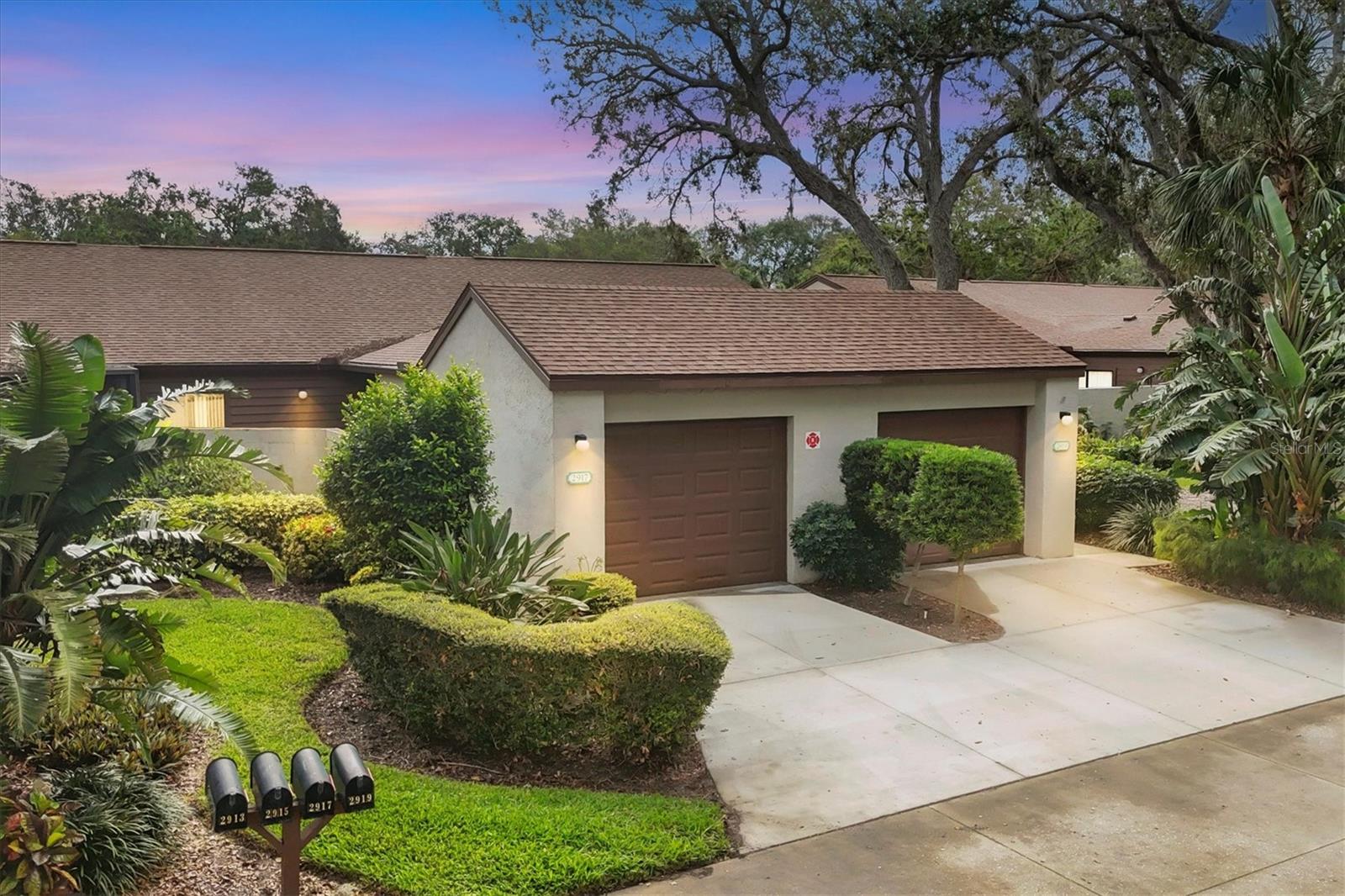 MOTIVATED SELLER! From the moment you step inside you'll feel you're finally at home. This lovely residence has been wonderfully updated offering 1100 sf of living area where you can enjoy your morning brew in your privately enclosed backyard. Forty Three West Oaks is truly unique, here you will find a community with a charm all its own where you can take leisurely walks throughout a neatly manicured neighborhood under the shade of beautiful mature oak trees. This 2 bedroom 2 bath home, which has been impeccably maintained and remodeled, is sure to please. The kitchen is just perfect with a closet pantry, barstool counter, new soft close cabinets & drawers and appliances. Enter this lushly landscaped home into a private front entry courtyard that can also be viewed from the guest bedroom. Additional updates include vertical blinds, fans, luxury vinyl plank flooring throughout and a freshly painted neutral color interior and ceiling that will easily complement any decor. The vaulted higher ceilings in the main living area and cathedral ceilings in the bedrooms add to this home's ambiance and exude a nice feeling of spaciousness. The Primary Suite has had the bathroom remodeled to reflect a new ceramic shower, vanity, faucet and toilet and has an 11' high closet that offers plenty of additional space for shelving. The 2nd bedroom's large oversized closet will surely have you smiling with all the storage space available and has a bathroom that also features a new vanity, faucet and showerhead. Enjoy the perks of having a new 2024 A/C, 2020 garage door, 3 year old water heater and a 2021 roof which are larger ticket items you won't be having to pay for. Your washer and dryer can be found in the enclosed single car garage that borders the front courtyard. Adding to all of this is the convenience of walking just across the street to the community's swimming pool and spa, tennis courts, pickle-ball and shuffleboard. Take a stroll around the grounds of this pet and age friendly neighborhood and fall in love!