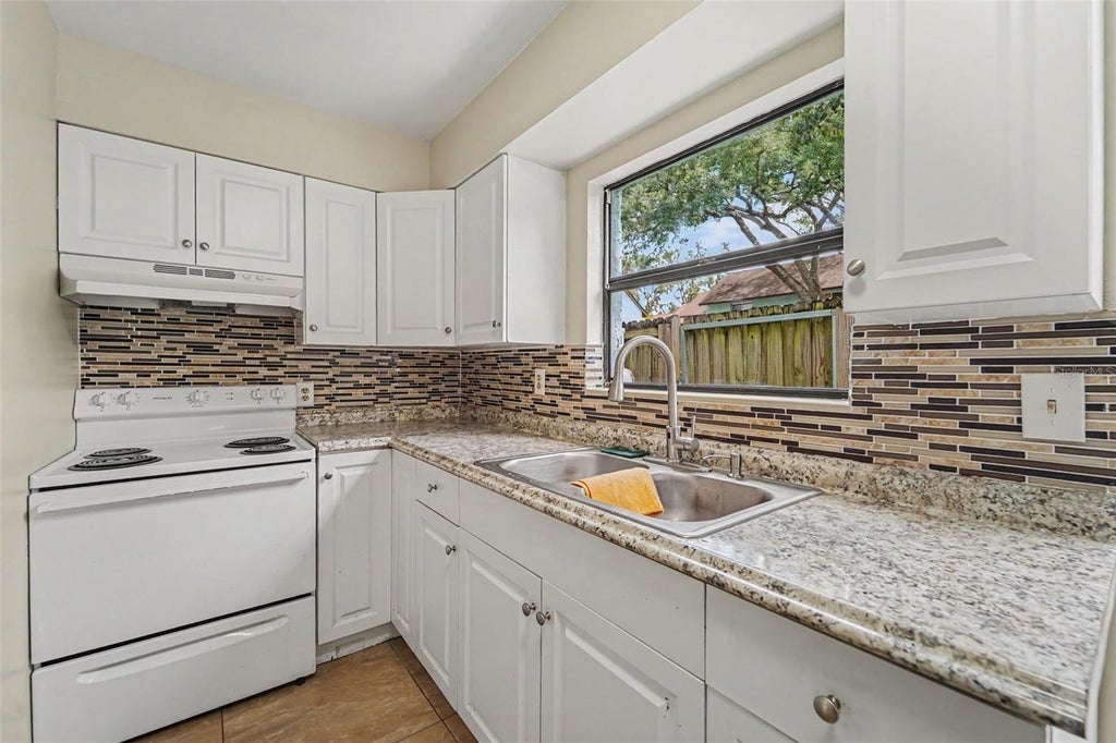 Photo of 12310 Touchton Drive #43, Tampa, FL 33617 (MLS # TB8543065)